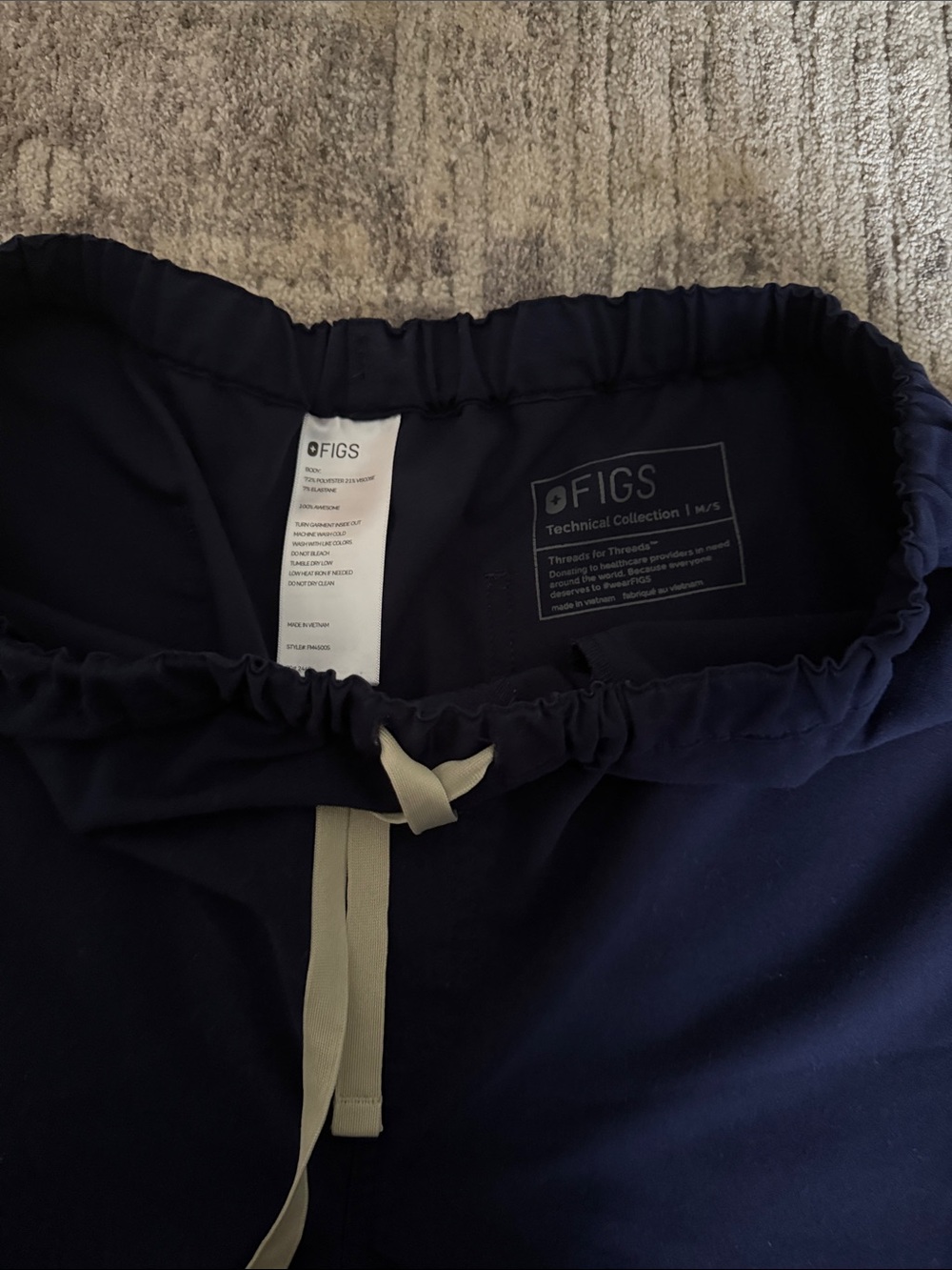 Figs Women’s Navy Scrub Top and Jogger Pants with Cream Drawstrings - Technical - Picture 16 of 16